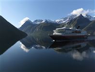 Hurtigruten in Hjorundfjord. Photo by Erika Tiren, Hurtigruten